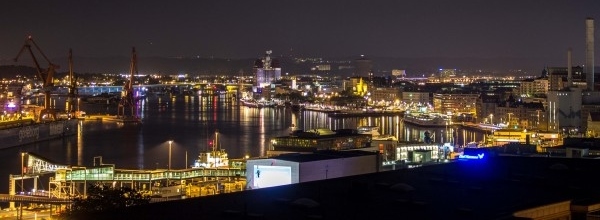 Their office overlooks the Gothenburg river. Several times a day, cruise ships can be seen passing out on their way to Denmark.